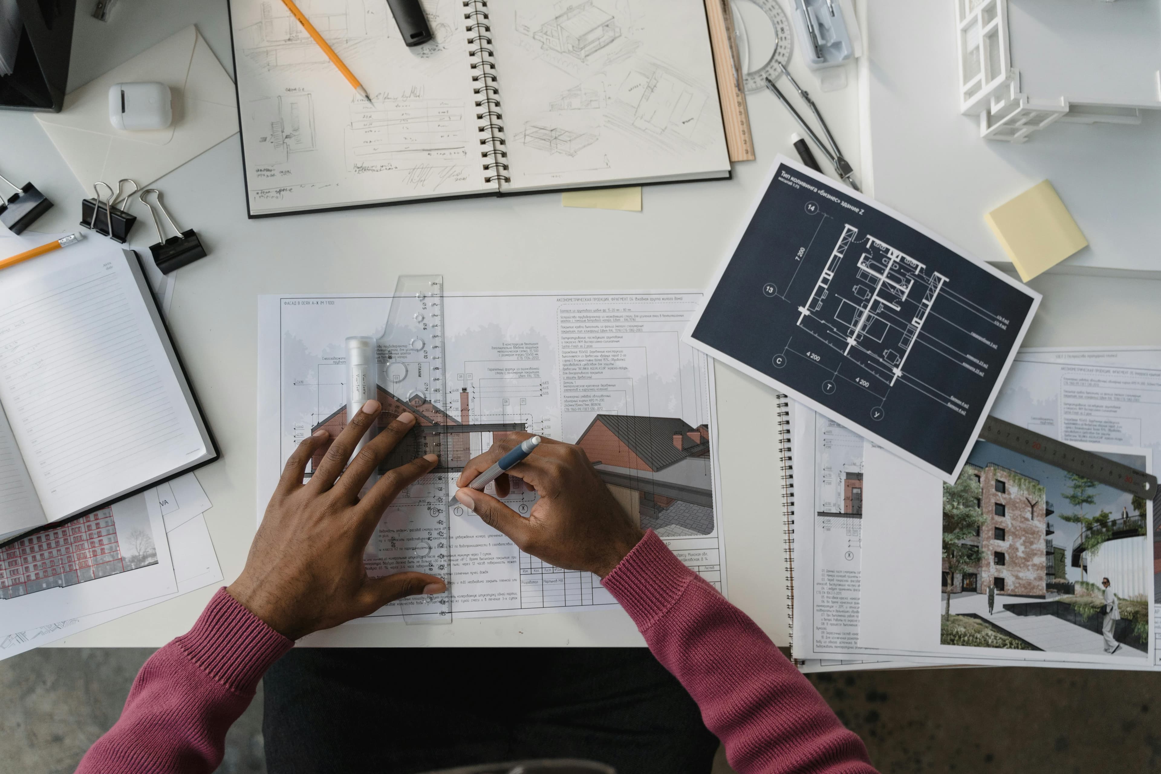Quantity surveying professionals reviewing construction plans and documents